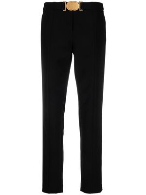 Moschino Smiley-buckle tapered trousers - Black