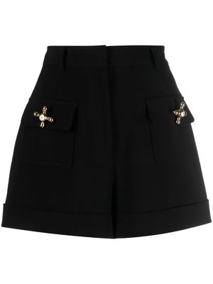 Moschino tap button-detail shorts - Black