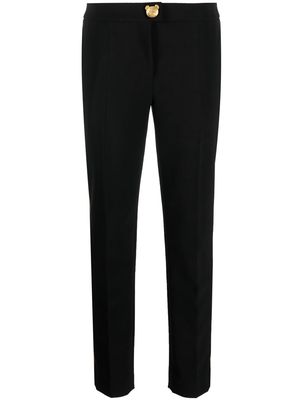 Moschino tapered side-stripe trousers - Black