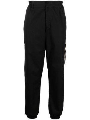 Moschino tapered stretch-cotton trousers - Black