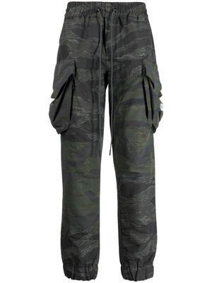 Mostly Heard Rarely Seen camouflage-pattern panelled cargo trousers - Green
