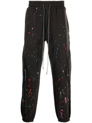Mostly Heard Rarely Seen paint-splattered tapered joggers - Black