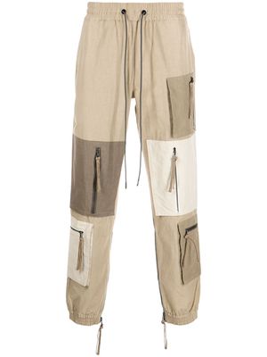 Mostly Heard Rarely Seen patchwork zip-pocket trousers - Brown