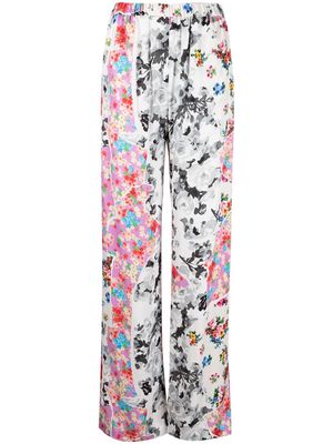 MSGM all-over floral-print trousers - White