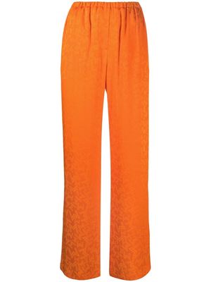 MSGM all-over star-print trousers - Orange