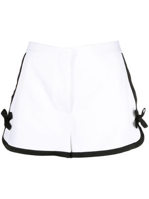 MSGM bow-detailing mid-rise mini shorts - White