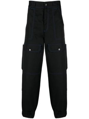 MSGM contrasting-stitch logo-patch trousers - Black
