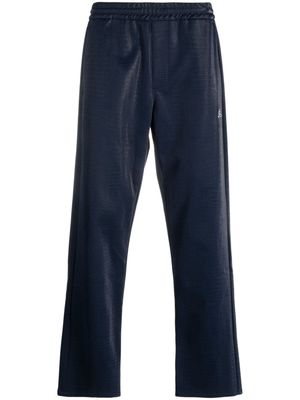 MSGM logo-patch textured-finish trousers - Blue