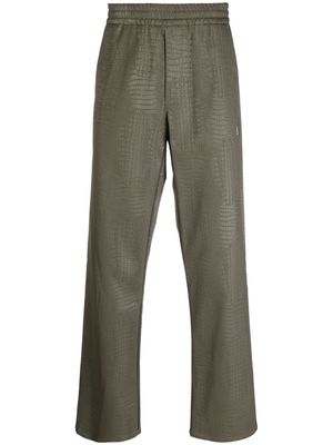 MSGM logo-patch textured-finish trousers - Green