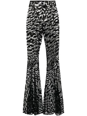 Mugler flocked-star-print mesh trousers - Black