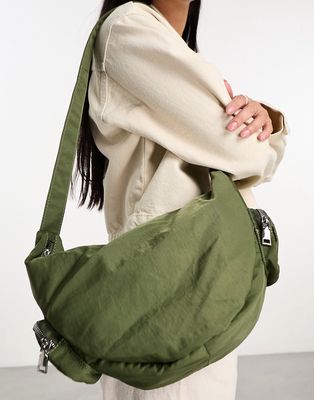 My Accessories London nylon sling bag with pockets in khaki-Green