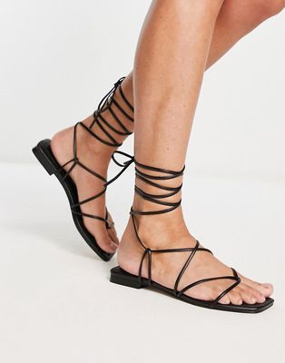 NA-KD lace up strappy flat sandals in black
