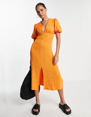 NA-KD x Femmeblk puff sleeve midi dress in orange