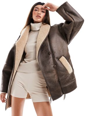 NA-KD x Hanna Schonberg belted shearling jacket in brown