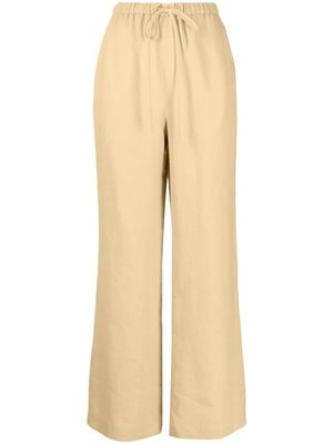 Nanushka drawstring -waist linen trousers - Yellow
