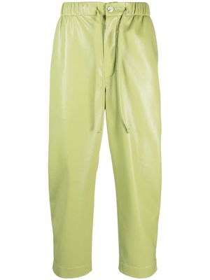 Nanushka Jain faux-leather tapered trousers - Green
