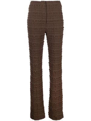 Nanushka Juna seersucker-texture slim-fit trousers - Brown