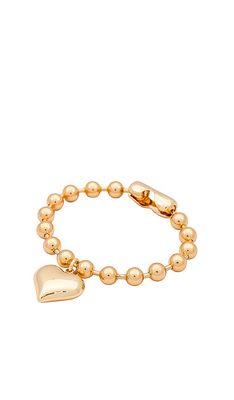Natalie B Jewelry Big Love Bracelet in Metallic Gold.