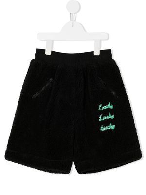 Natasha Zinko Kids embroidered slogan fleece shorts - Black