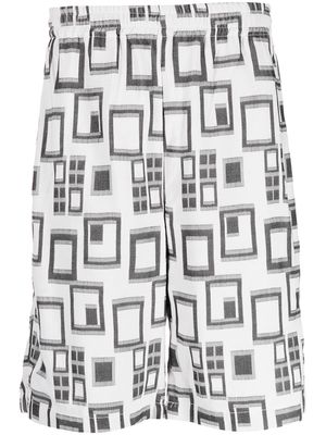 Needles geometric-print Bermuda shorts - Black