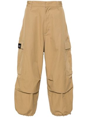 Neighborhood logo-tag cotton wide-leg trousers - Brown