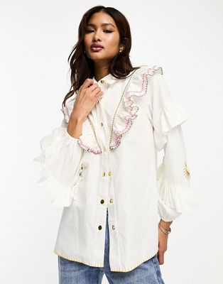 Never Fully Dressed ruffle sleeve embroidered shirt in white