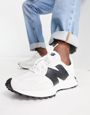 New Balance 327 sneakers in white and black