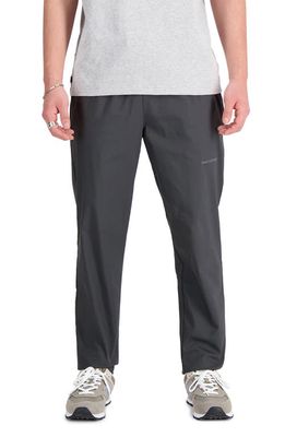 New Balance Athletics Linear Woven Track Pants in Blacktop