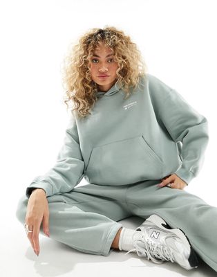 New Balance Linear Heritage brushed back hoodie in green-Gray