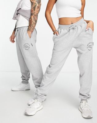 New Balance Unisex runners club sweatpants in gray - Exclusive to ASOS