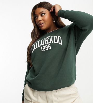 New Look Curve Colorado slogan sweatshirt in dark green