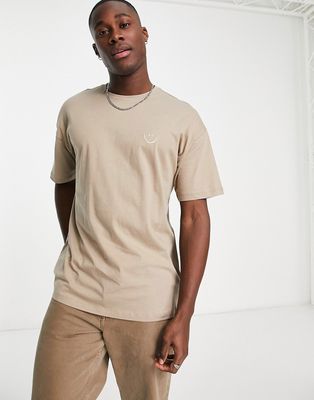 New Look oversized smile embroidered t-shirt in light brown