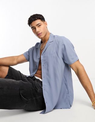 New Look palm revere collar shirt in dark blue