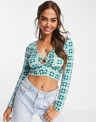 New Look ring detail ruched long sleeve crop top in blue retro print