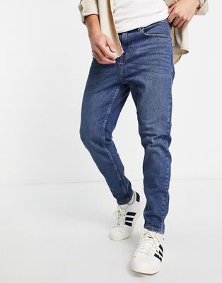New Look tapered jeans in dark wash blue-Blues