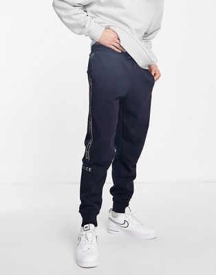 Nicce pulse taping sweatpants in navy