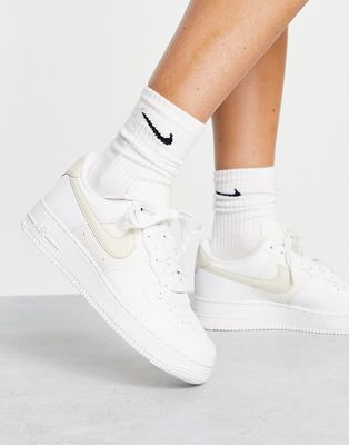 Nike Air Force 1 '07 sneakers in white and baby yellow