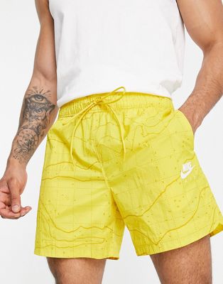 Nike Air graphic logo woven shorts in yellow