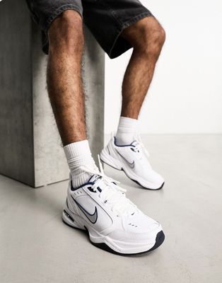 Nike Air Monarch IV sneakers in white and black