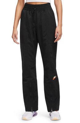 Nike City Utility Zip Cuff Track Pants in Black/Black/Safety Orange