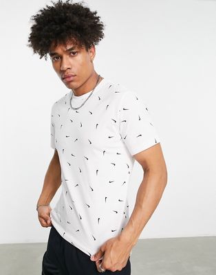 Nike Club all over print Swoosh t-shirt in white
