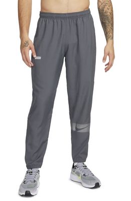 Nike Dri-FIT Flash Challenger Running Pants in Iron Grey