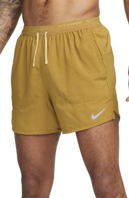 Nike Dri-FIT Stride 5-Inch Running Shorts in Bronzine/Buff Gold