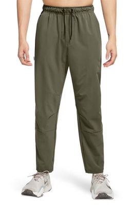 Nike Dri-FIT Unlimited Drawstring Pants in Medium Olive/Black