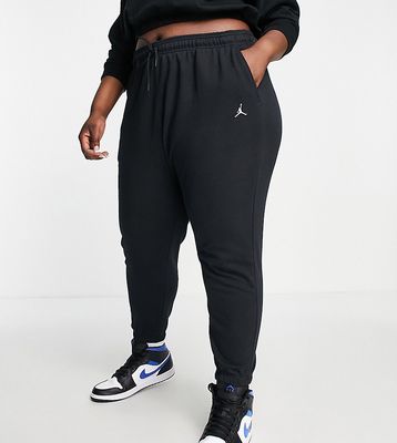Nike Jordan Plus Essentials cuffed fleece sweatpants in black