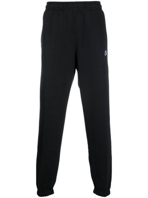 Nike logo-embroidered cotton track pants - Black