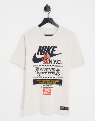 Nike NYC Souvenir graphic print T-shirt in cream-Brown