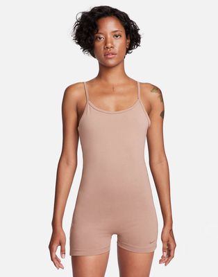 Nike one piece jumpsuit with tape detail in beige-White