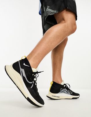 Nike Pegasus Trail 4 sneakers in black and coconut milk
