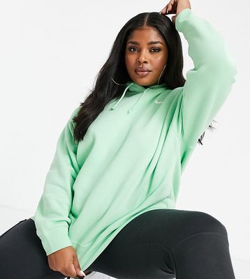 Nike Plus mini swoosh oversized hoodie with tuck sleeve detail in green